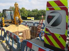 Corrugated iron shoring shields secure the project excavation. Corrugated iron shoring shields secure the project excavation.